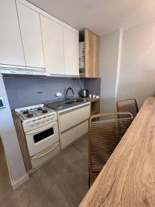 Kuchyň nebo kuchyňský kout v ubytování Prisma Apart + 23 fotografií