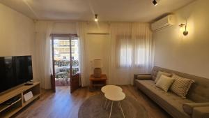 Μια τηλεόραση ή/και κέντρο ψυχαγωγίας στο Adumar, apartamento renovado en el puerto de Jávea