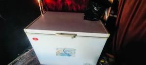 a white refrigerator with a lid on top of it at Wadi Ghowair View Camp in Al Khuraybah
