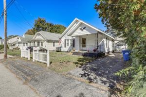 a house with a white fence in front of it at 2 Mi to Mohegan Sun and Dtwn Home in Norwich in Norwich
