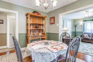 a dining room with a table and chairs at 2 Mi to Mohegan Sun and Dtwn Home in Norwich in Norwich +16 photos