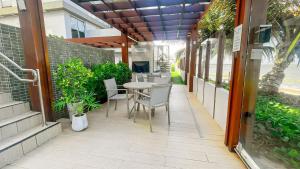 En balkon eller terrasse på Branco Haus Seaview By Living