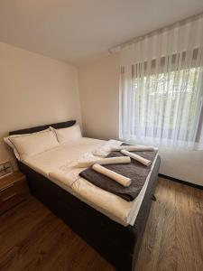 Llit o llits en una habitació de Orex Hotel 12 fotos més