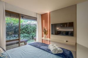 Giường trong phòng chung tại Nannai Residence - Muro Alto - Porto de Galinhas +48 ảnh