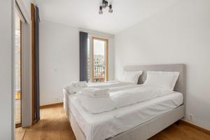 Ένα ή περισσότερα κρεβάτια σε δωμάτιο στο Moderne 2 - Roms Leilighet i Vannkunsten Syd