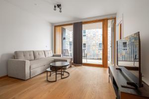 Χώρος καθιστικού στο Moderne 2 - Roms Leilighet i Vannkunsten Syd