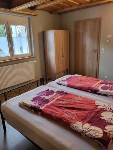 Postel nebo postele na pokoji v ubytování Ferienhaus Meisennest Bischof 97633 Sulzfeld-Leinach