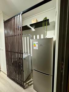 Η κουζίνα ή μικρή κουζίνα στο Moderno departamento en Las Condes