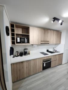 Η κουζίνα ή μικρή κουζίνα στο Moderno departamento en Las Condes