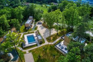 an aerial view of a house with a swimming pool at Le Pech Eternel - La Truffière in Sarlat-la-Canéda