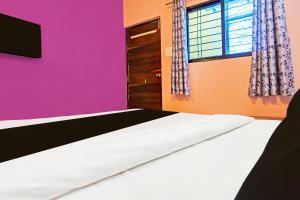 Postel nebo postele na pokoji v ubytování HOTEL O STAR PALACE