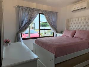Giường trong phòng chung tại Depa Agradable en Cerritos, Cerca de la Playa +38 ảnh