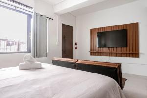 Μια τηλεόραση ή/και κέντρο ψυχαγωγίας στο Cozy Studio Suite - Art District