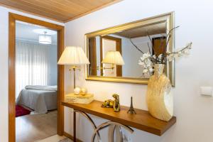 En eller flere senge i et værelse på Apartamento 55