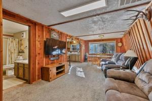 TV a/nebo společenská místnost v ubytování Island Hideaway