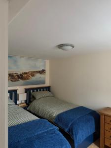 En eller flere senge i et værelse på Beautiful Barn Conversion Wyboston