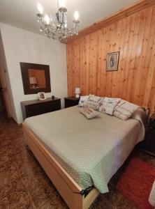 En eller flere senge i et værelse på La casa della Lavanda