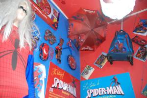 a wall with a spider man toy and some umbrellas at Catania SpidermanHouse I in CTA