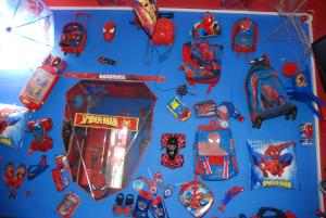 a group of toys on a blue wall at Catania SpidermanHouse I in CTA