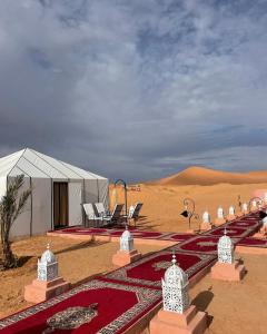 a tent in the middle of the desert at Orion Luxury Desert Camp in Merzouga