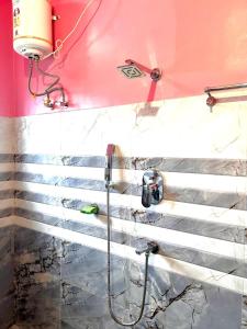 Koupelna v ubytování Jyoti Homestay