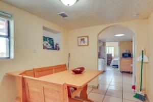 a dining room table with a bowl on top of it at Walk Downtown Authentic Adobe Home in Las Cruces! in Las Cruces