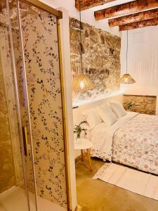 Ένα ή περισσότερα κρεβάτια σε δωμάτιο στο ruralhomemora