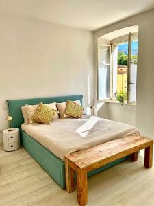 Ένα ή περισσότερα κρεβάτια σε δωμάτιο στο New! La Corte, vicino al Duomo