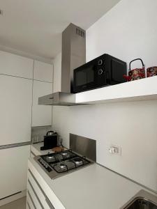 Η κουζίνα ή μικρή κουζίνα στο New! La Corte, vicino al Duomo