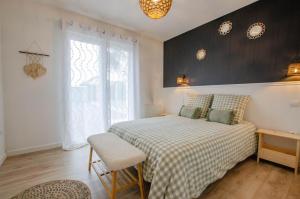 Ένα ή περισσότερα κρεβάτια σε δωμάτιο στο La jouquiniere