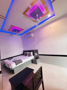 Ένα ή περισσότερα κρεβάτια σε δωμάτιο στο Hotel The Peace Point