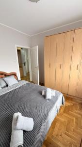 Ένα ή περισσότερα κρεβάτια σε δωμάτιο στο Apartman Bella Vita