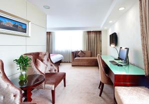 TV o dispositivi per l'intrattenimento presso New World Hotel