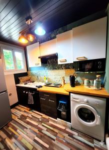 Η κουζίνα ή μικρή κουζίνα στο Jungle Chic à Noyon, Hauts-de-France