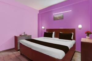 Postel nebo postele na pokoji v ubytování Hotel O Green Park Residency 2
