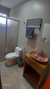 a bathroom with a sink and a toilet at Casa Bella Vizcaína in Mineral de Pozos