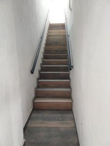 a stairway with a set of stairs in a building at Pousada Nossa Senhora de Copacabana in Aparecida