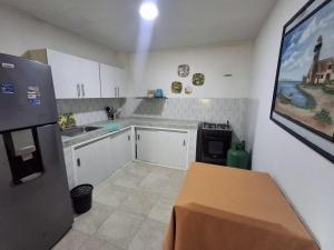 Kuchyň nebo kuchyňský kout v ubytování Cabaña Olazul