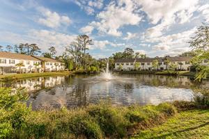 a river with a fountain in the middle at 306 Reserve Lane in Jewtown