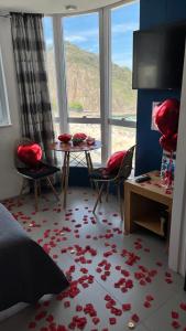 Χώρος καθιστικού στο suite deluxe vista mar Copacabana - entrada independente