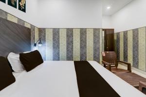 Postel nebo postele na pokoji v ubytování Hotel O Vivanta Resorts