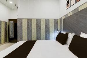 Postel nebo postele na pokoji v ubytování Hotel O Vivanta Resorts + 21 fotografií