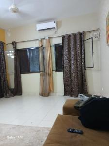 TV a/nebo společenská místnost v ubytování RESIDENCE Sidi