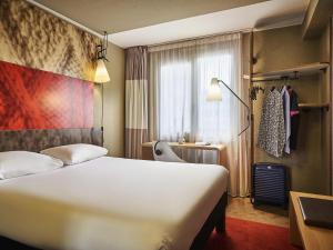 Ένα ή περισσότερα κρεβάτια σε δωμάτιο στο ibis Paris Avenue d'Italie 13ème +112 φωτογραφίες