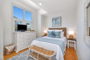 Postel nebo postele na pokoji v ubytování 22 Coast - Wave Cottage + 31 fotografií