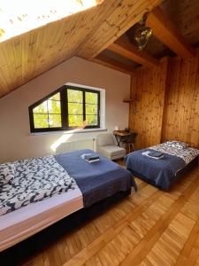 Ένα ή περισσότερα κρεβάτια σε δωμάτιο στο Prime Home SOPOT HILL