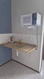 Η κουζίνα ή μικρή κουζίνα στο Quartos Itapê +56 φωτογραφίες