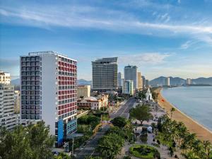 a view of a city with a beach and buildings at Novotel Nha Trang in Nha Trang