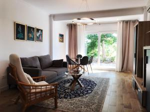 a living room with a couch and a table at Mary's house in Denia