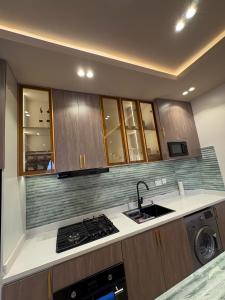 Η κουζίνα ή μικρή κουζίνα στο Exclusive London Apartments